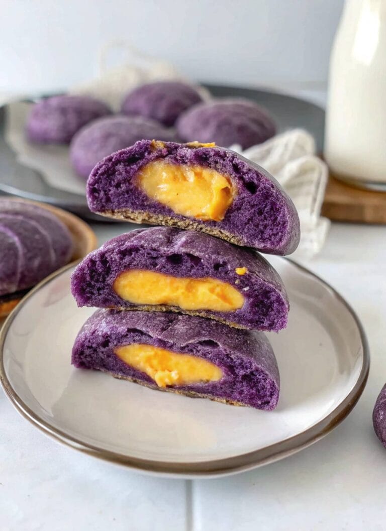 final delicious Ube Halaya Stuffed Pandesal on a plate