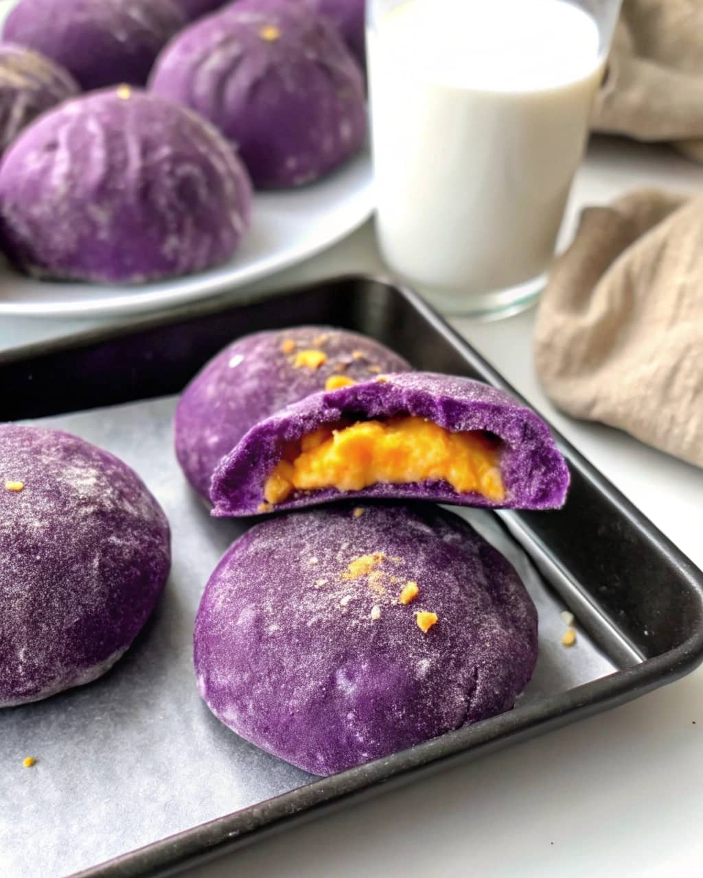 Ube Halaya Stuffed Pandesal on a plate