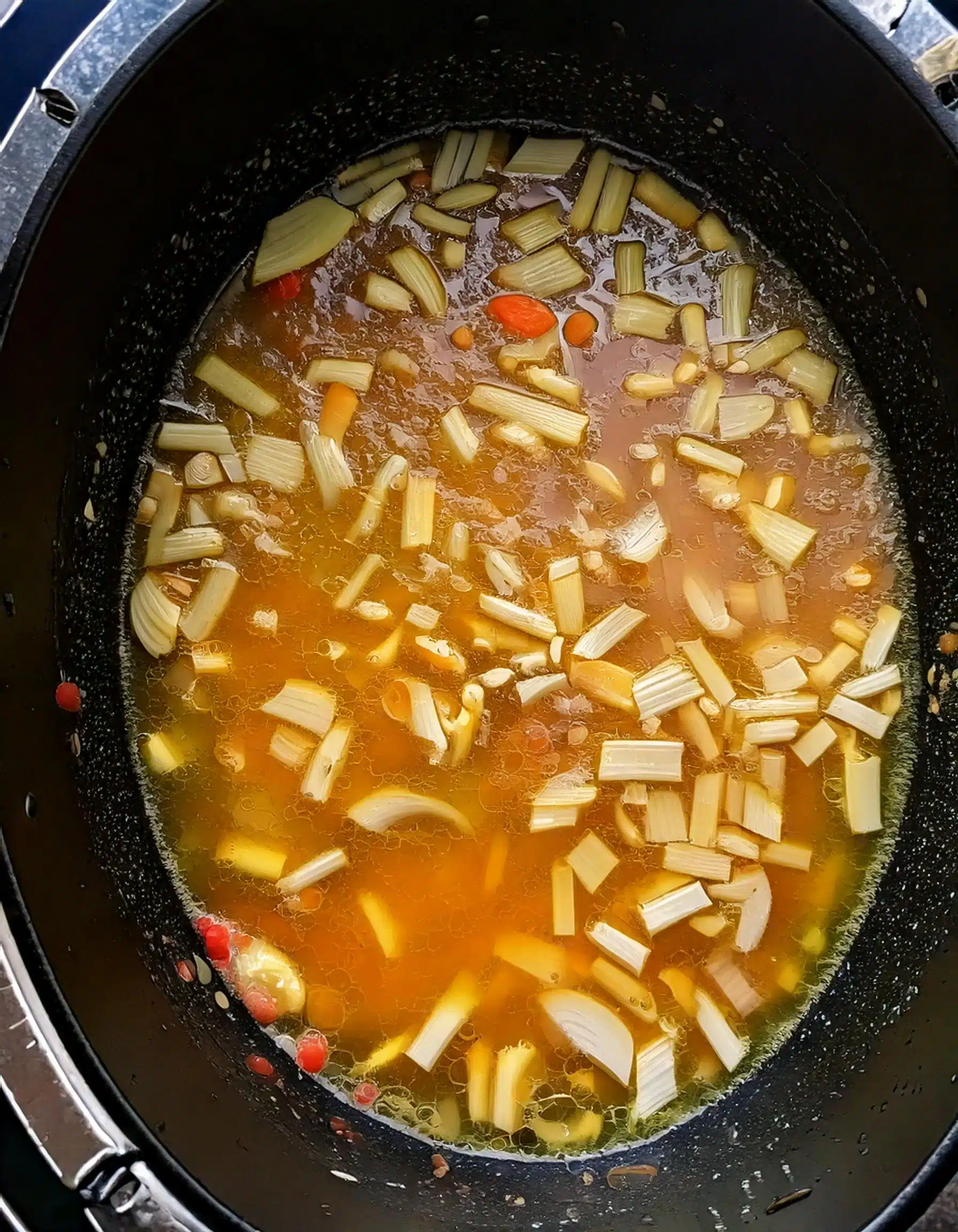 Lentil soup simmering in a crockpot.